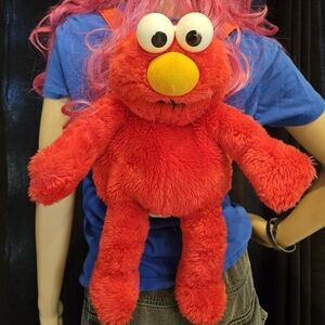 Vintage 1997 Elmo plush Raver backpack.